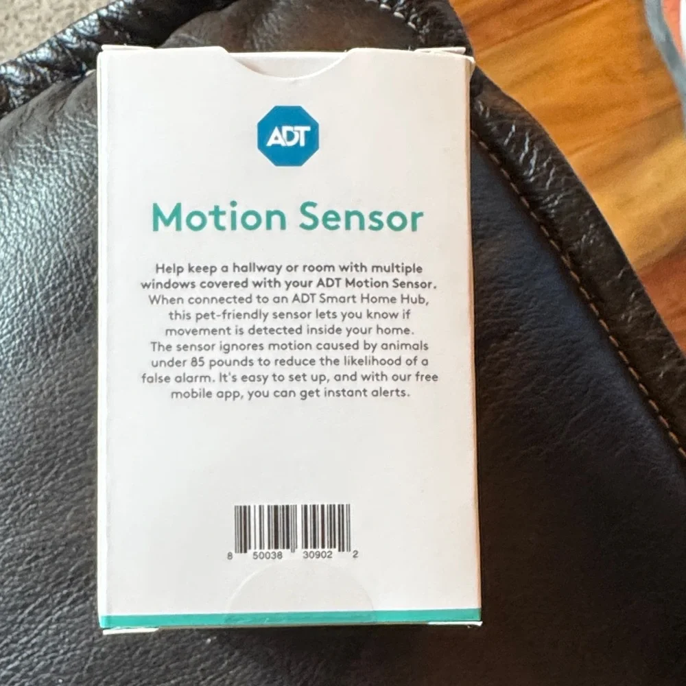 ADT White Motion Sensor with Teal Accents